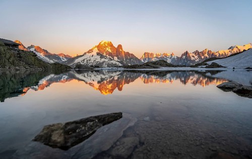 Evening mood, mountain landscape at sunset, alpenglow, water reflection in Lac Blanc, mountain