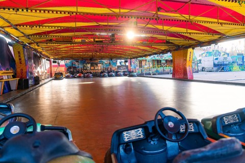 A colourful bumper car hall with lights, ready for use at a fair, Fasnet, Weil der Stadt, Böblingen