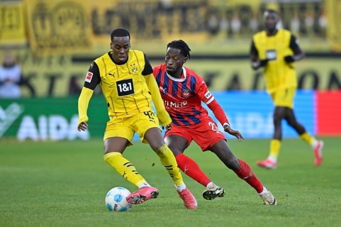 Duel, action Jamie Bynoe-Gittens Borussia Dortmund BVB (43) against Omar Haktab Traore 1. FC
