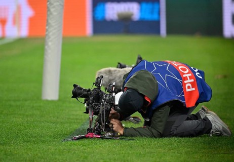 Sports photographer adjusts his backdoor camera, Champions League, MHPArena, MHP Arena Stuttgart,