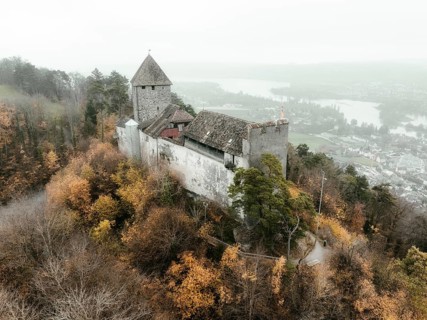 Aerial view of Hohenklingen Castle above Stein am Rhein on a foggy autumn day, Canton Schaffhausen,