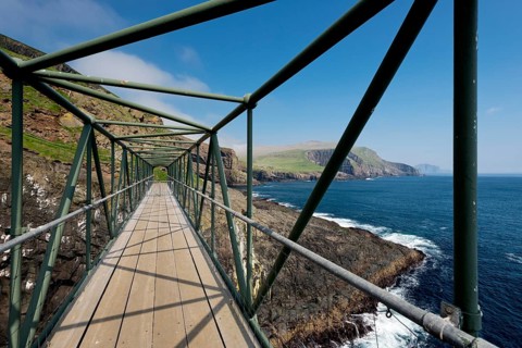 So-called Atlantic Bridge, pedestrian bridge over rock crevice Hólmgjógv, Mykines, Útoyggjar, Faroe
