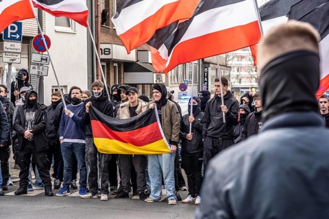 The neo-Nazi group Jung und Stark, JS, demonstrates in the city centre of Essen, demanding the