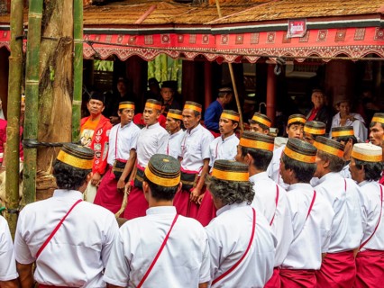 Men in traditional festive dress, funeral ceremony, Tana Toraja, Sulawesi, Indonesia, Asia