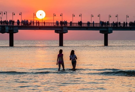 Sunset at the pier in Miedzyzdroje, Western Pomerania, Poland, East Europe, Europe