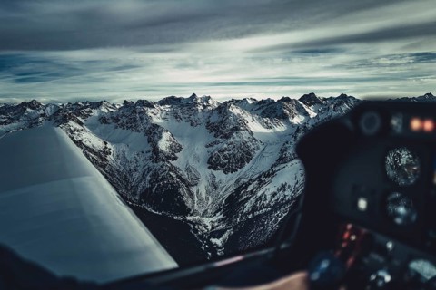 Flight over the late winter Lech Valley with a small aeroplane in Tyrol, Austria, Europe