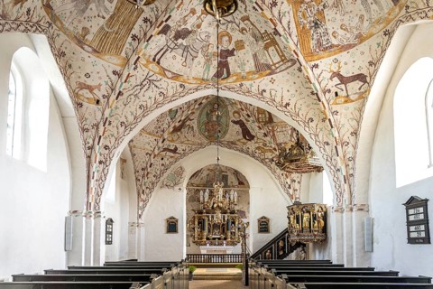 Interior with religious frescoes by the Elmelunde Master in the church of Elmelunde, Mön Island,