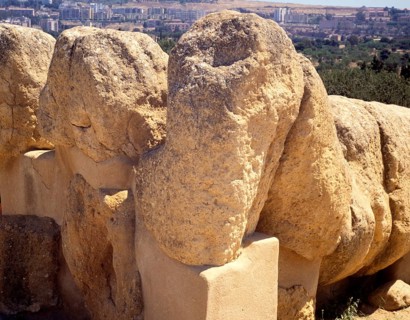 Head and arms Greek ruins Giant statue of Atlas or Telamon, Temple of Zeus, Akragas, Agrigento,