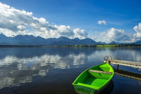 Green rowing boat, Hopfensee, Hopfen am See, near Füssen, Ostallgäu, Allgäu, Bavaria, Germany,