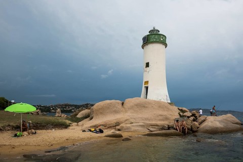 Lighthouse with beach and bizarre granite rocks, Spiaggia Porto Faro, Faro di Punta Palau, Palau,