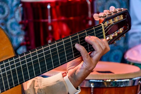 Acoustic guitar player in stage during brazilian popular music presentation Belo Horizonte, Minas