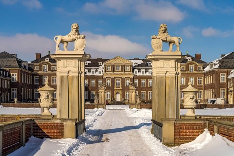 Portal to the snow-covered Nordkirchen Castle in winter, Nordkirchen, Münsterland, North