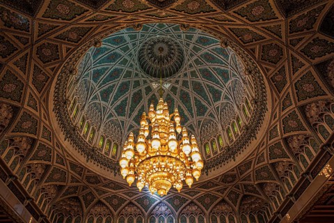 Dome and illuminated chandelier in the Sultan Qaboos Mosque, Muscat, Arabian Peninsula, Sultanate