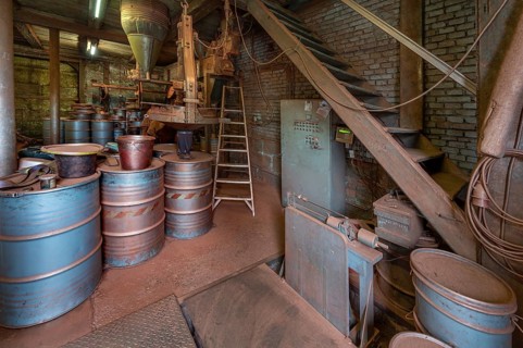 Metal barrels in the bronze powder filling room of a metal powder mill, founded in 1900, Igensdorf,