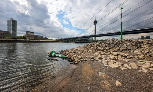 Düsseldorf, North Rhine-Westphalia, Germany, Overturned fairway buoy at low water in the Rhine in