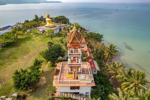 The big Buddha of Wat Ao Salat in the fishing village of Ban Ao Salad seen from the air, Ko Kut