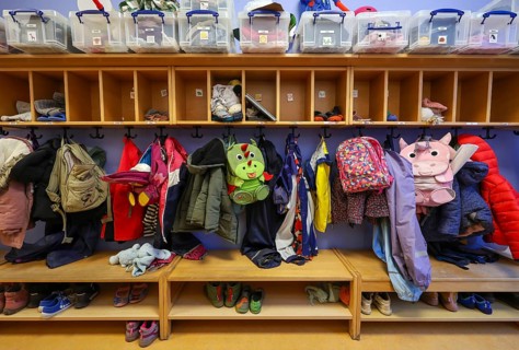 Germany - Symbolic image KITA. Children's coats, jackets and unicorn rucksacks hang on a coat rack