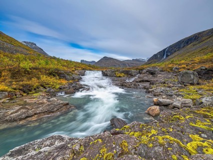 Autumn in Reinheimen National Park, mountains with river in Valldalen valley, Stigbotthornet