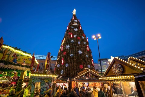 The largest Christmas tree at the Dortmund Christmas market at dusk, Dortmund, North