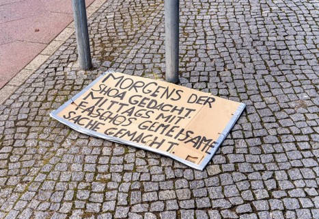 On the pavement, cardboard with election slogan after a demonstration, Berlin, Germany, Europe