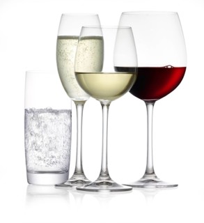 Various glasses filled with red wine, white wine, sparkling wine and water, studio shot