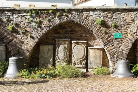 Remains of the town wall with gravestones next to the Nicolai Church, Döbeln, Saxony, Germany,