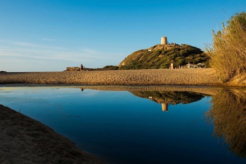 Sandy beach beach and blue sea, sunrise, Spiaggia di Su Portu, Torre di Chia, Chia, south coast,
