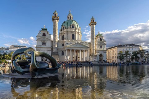 Sculpture by Henry Moore Hill Arches and the Karlskirche in Vienna, Austria, Europe