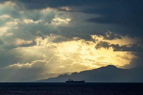 Sun rays in the clouds over Sicily, Tyrrhenian Sea, Italy, Europe