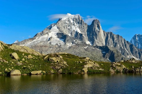 At the Lacs des Chéserys mountain lake in the Aiguilles Rouges nature reserve, view of the Aiguille