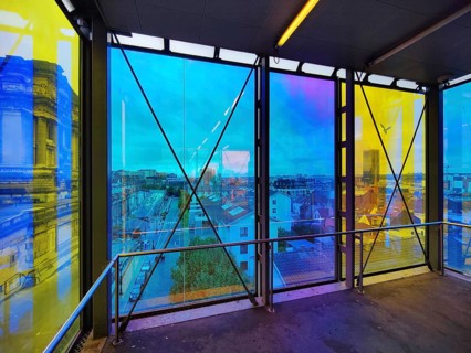 Marollescenece, art installation The Cube, coating of the windows with translucent dichroic films,