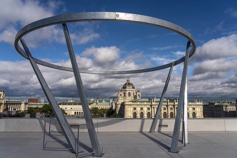 The MQ Dragonfly on the roof of the Leopold Museum with a view of the Kunsthistorisches Museum,