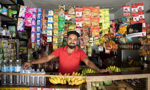 Sri Lankan man in his shop on Kandy Road, Ramboda, Nuwara Eliya, Central Province, Sri Lanka, Asia