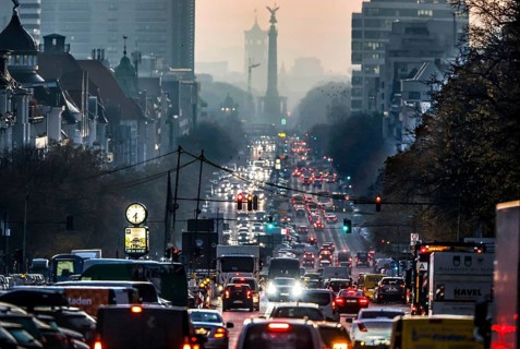 Berlin's landmarks on the busy Kaiserdamm and Bismarckstraße are shrouded in fog during the morning