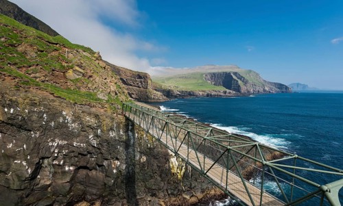 So-called Atlantic Bridge, pedestrian bridge over rock crevice Hólmgjógv, Mykines, Útoyggjar, Faroe