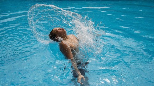 Thirteen-year-old boy, swimming pool