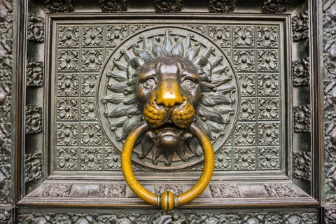 Lion's head, door knocker at the entrance portal, west façade, Cologne Cathedral, Cologne, North