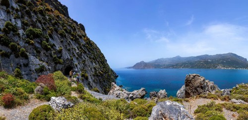 Hikers on the Sarella peninsula near Plakias, south coast, Crete, Greece, Europe