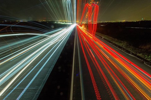 A7 Motorway, Autobahn, beside Kassel at night with light trails from the traffic headlights and