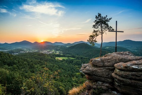 Sandstone rock with pine tree and summit cross, Rötzenfelsen, sunrise, Gossersweiler-Stein,