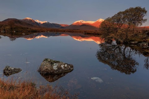 Mountains reflected in lake, morning light, morning mood, still, autumn, snowy, Lochan na