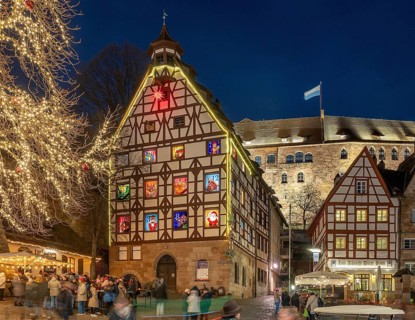 Pilatushaus, built in 1489, a historic town house with an Advent calendar on 18 December 2024 at