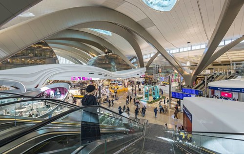 Abu Dhabi Airport, Zayed International Airport with passengers. Duty free shop. The new Terminal A