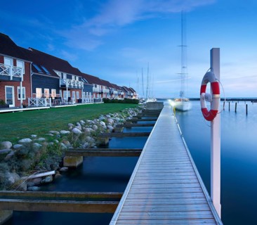 Klintholm Havn, jetty, sailing yachts and holiday homes in the harbour, night shot, Møn Island,