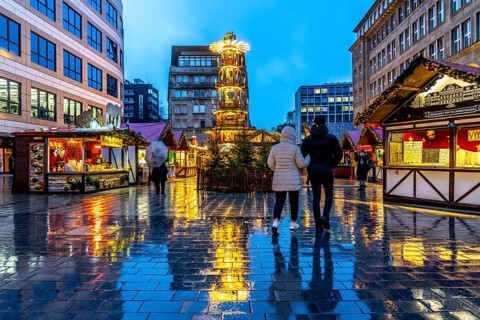 Empty Christmas market, Willy-Brandt-Platz, rainy weather, Essen, North Rhine-Westphalia, Germany,