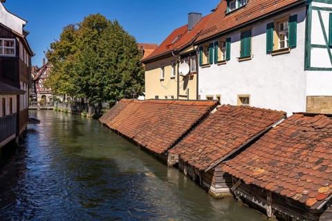 Wooden fish boxes on the Wiesent in Forchheim, Upper Franconia, Bavaria, Germany, Europe