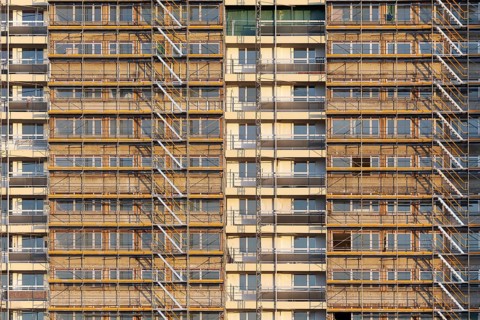 Scaffolded high-rise building from the 1970s, refurbishment in the Hochheide residential park,