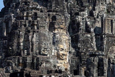 Giant stone-carved faces of the Bodhisattva Lokeshvara, also known as Avalokiteshvara, Bayon