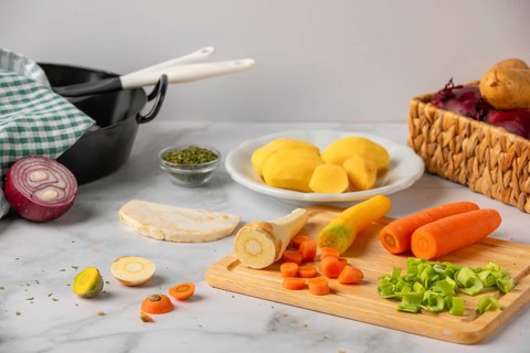 Peeled and chopped soup vegetables and potatoes, prepared for cooking