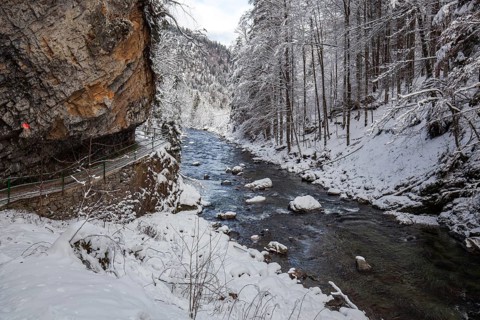 Winter, snowy landscape, river Breitach and hiking trail through the Breitachklamm gorge near